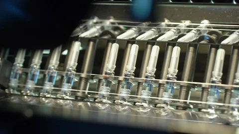 Pharmaceutical manufacturing line automatic machine at factory. Production Stock Footage 99713440