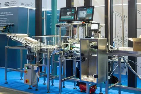 Pharmaceutical packaging line on the Pharmtech Exhibition Stock Photos