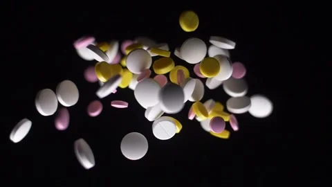 Pharmaceutical symbol pills fly 2 Stock Footage 147642989