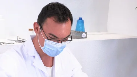 Pharmaceutical worker performs chemical analysis Stock Footage 117333309