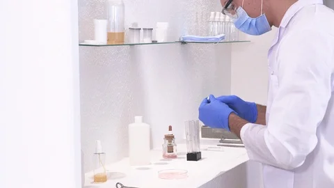 Pharmaceutical worker performs chemical analysis Stock Footage 118206513