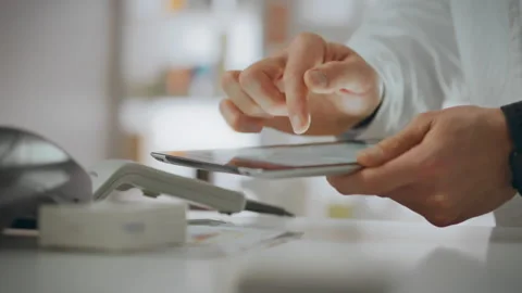 A pharmacist assistant applies their knowledge by operating an electronic de Stock Footage 277163862