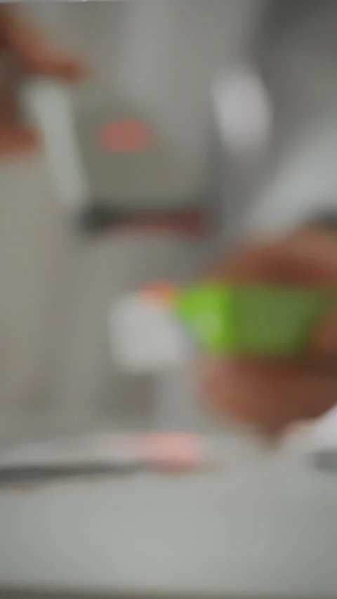 Pharmacist assists customers using tools in modern pharmacy setting Stock Footage 331676506