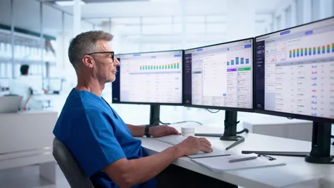 Pharmacist Carefully Managing Medication Inventory Stock Footage 345857443