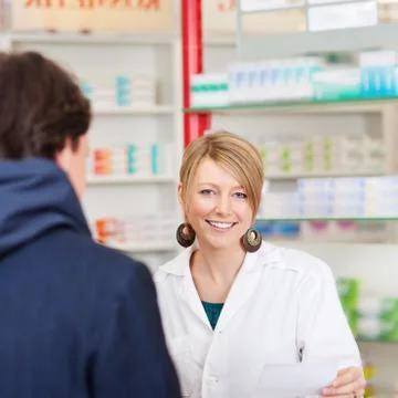 Pharmacist in a consultation Stock Photos