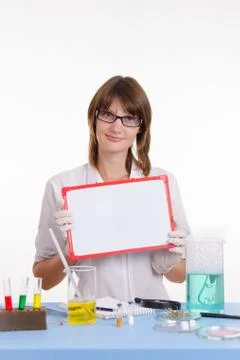 Pharmacist holding a tablet Stock Photos