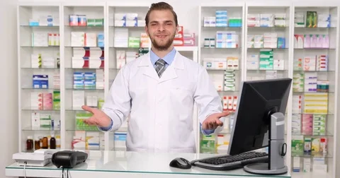 Pharmacist Man Talking Looking Camera Optimistic Presentation Pharmacy Interior Stock Footage 77009709