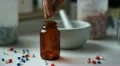 pharmacist puts capsules in a jar HD Footage