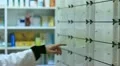 pharmacist taking medicines from the drawer HD Footage
