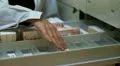 pharmacist taking medicines from the drawer HD Footage