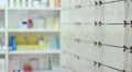 Pharmacist taking medicines from the drawer HD Footage