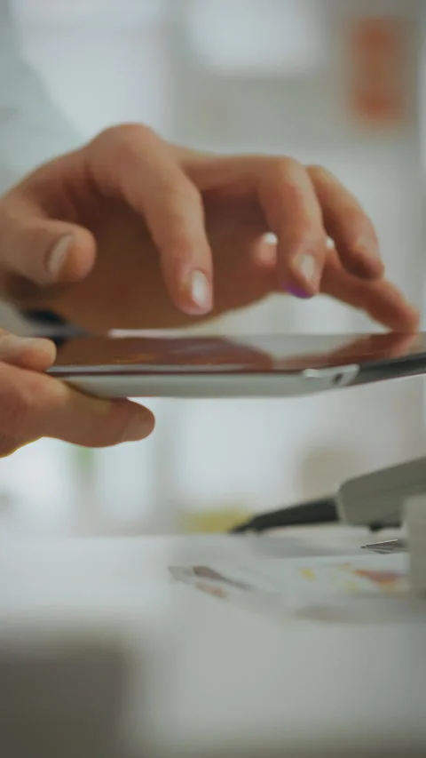Pharmacist uses tablet to enter data and manage prescriptions in a pharmacy Stock Footage 331676930