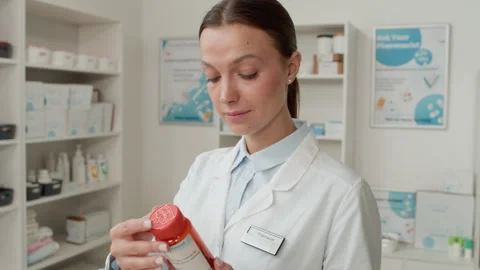 Pharmacist using Computer at Work Stock Footage 334865937