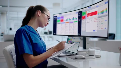 Pharmacist Using Pharmacy Software To Manage Prescriptions Stock Footage 345859053