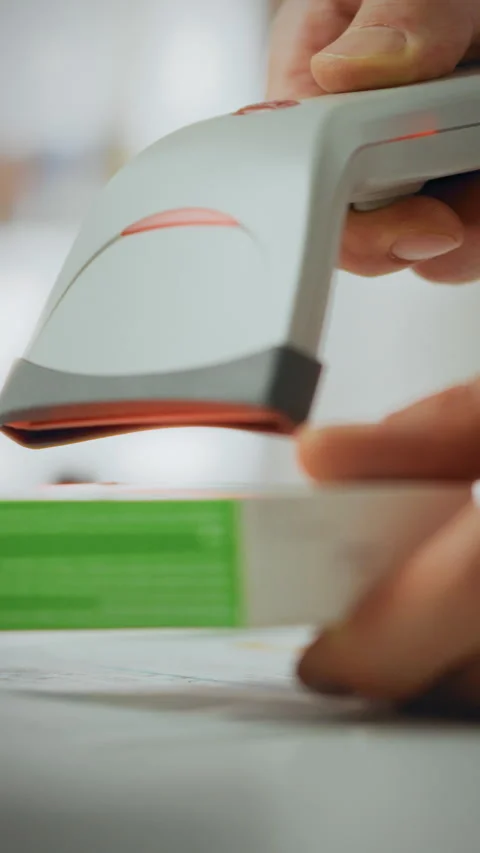 Pharmacist using scanning device for medication verification in pharmacy Stock Footage 331677005