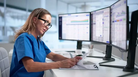 Pharmacist Using Software System To Manage Medication Inventory Stock Footage 345854768