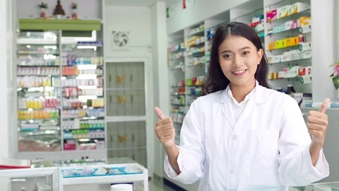 Pharmacist working in drugstore Stock Footage 113976242