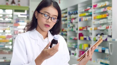 Pharmacist working in drugstore Stock Footage 113976255