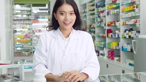 Pharmacist working in drugstore Stock Footage 113976285