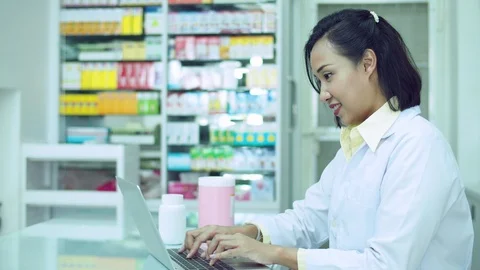 Pharmacist working in drugstore Stock Footage 113976626