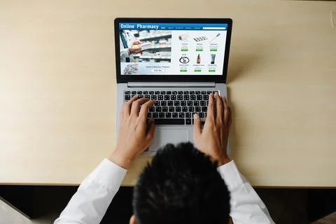 On pharmacy online store on computer screen shopping for medical products snugly Foto stock