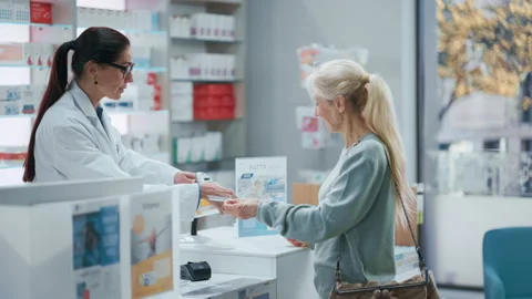 Pharmacy Pharmacist Checkout Servicing Customers Stock Footage 147947673