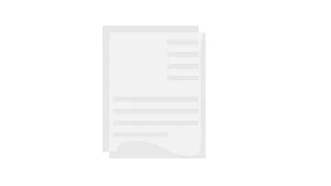 Pharmacy school application essay with handwritten notes and a laptop on a .. Stock Footage 332535127