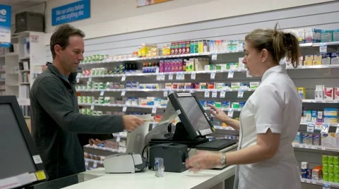 Pharmacy transaction Stock Footage 51850526
