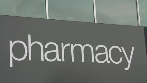 Pharmacy writing caption text sign in white writing on gray background Stock Footage 246611421