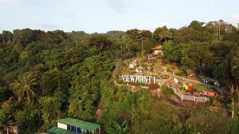 Phi Phi Don Beach, forest and homes at sunset, Thailand from drone Stock-Footage 153354358