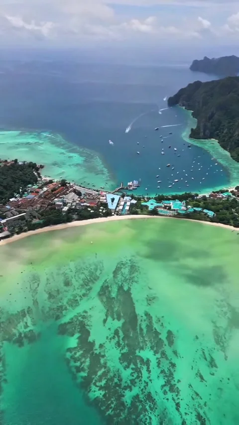 Phi Phi Don Island Aerial View with Isthmus Sandbar and Turquoise Bays Stock Footage 341008783
