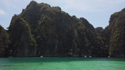 Phi Phi island from a boat, entering the Bay, where the Beach movie was filmed Stock Footage 129076956