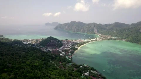 Phi Phi island mountains aerial and coral reef on a hazy sunny spring day Stock Footage 251999005