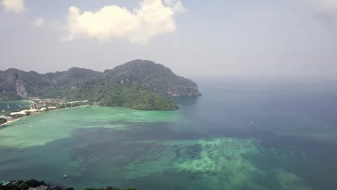 Phi Phi island mountains aerial and coral reef on a hazy sunny spring day Stock Footage 251999026