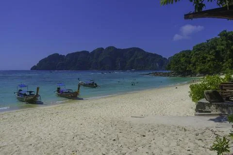 Phi phi island seascape with long tail boat in Krabi Thailand Stock Photos