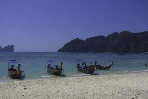 Phi phi island seascape with long tail boat in Krabi Thailand Stock Photos