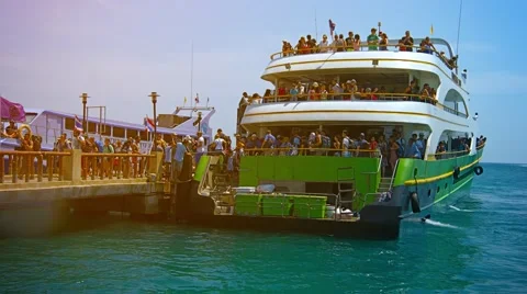PHI PHI ISLAND, THAILAND - CIRCA FEB 2015: Crowd of Tourists Disembarking fro Stock-Footage 53556013