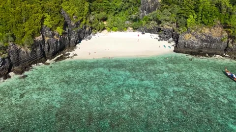 Phi Phi Islands. Beautiful secluded Nui Beach surrounded by rocks Stock Footage 315848088
