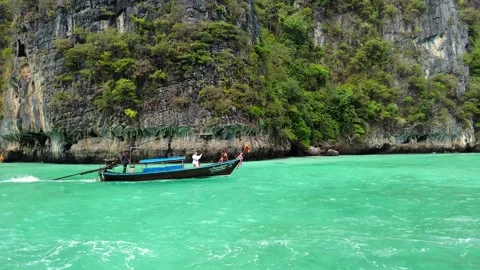 Phi Phi Islands, blue lagoon, boat, turquoise water, tour, Thailand, clear water Stock Footage 247915863