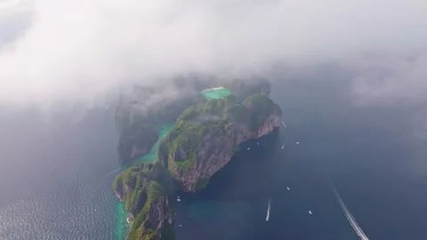 Phi Phi Lee island aerial with Maya Bay and Phi Leh Bay, Thailand Stock Footage 303358287