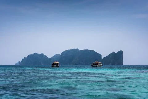 Phi Phi Leh, seen from Tonsai bay, in Koh Phi Phi Island, Thailand. Blue sea  Stock Photos