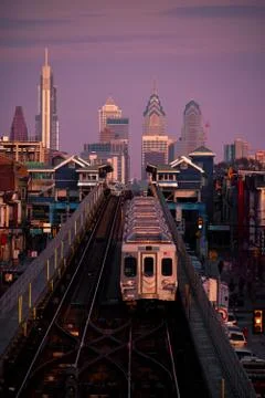 Philadelphia skyline and train Stock Photos