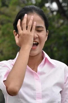 Philippine Female Memory Problems Wearing Pink Shirt Portrait Foto stock