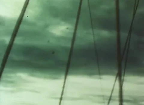 PHILIPPINES - 1943: Naval battle - Storm Clouds behind Ship Masts Stock Footage 343786559
