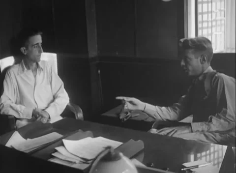 PHILIPPINES - 1945: Document check - Soldier presents card across desk Stock Footage 343848858