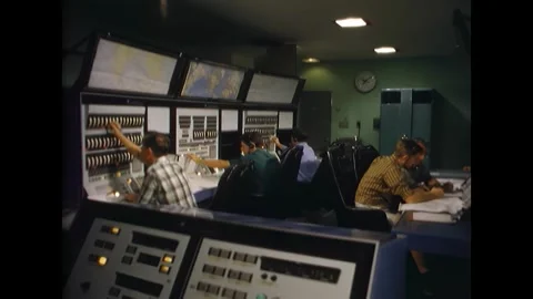 PHILIPPINES - 1965 - The civilian operator of the command communicator pushes Stock Footage 341862787