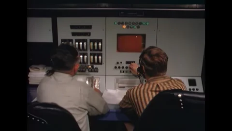 PHILIPPINES - 1965 - Two civilian technicians operate the aeromedical console Video stock 341862791