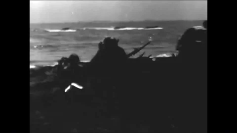 The Philippines are invaded during World War II amidst intense fighting. Stock Footage 86137567