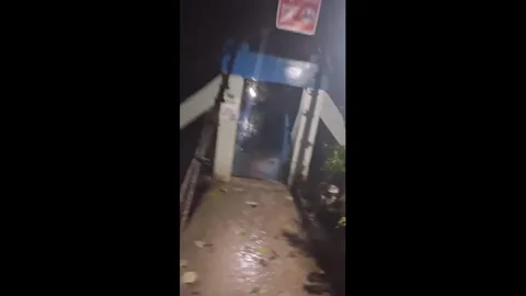 Philippines: Bridge collapses during storm flooding in Iligan, Philippine... Stock Footage 328365063