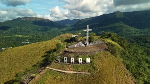 Philippines, Coron, 21 May, 2026 Aerial View Hilltop Cross and Mountain Video stock 335475883